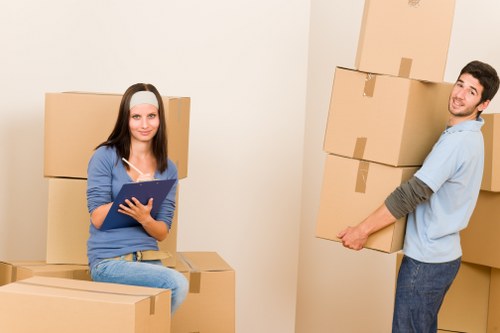 Professional staff assisting with furniture removal in South Kensington